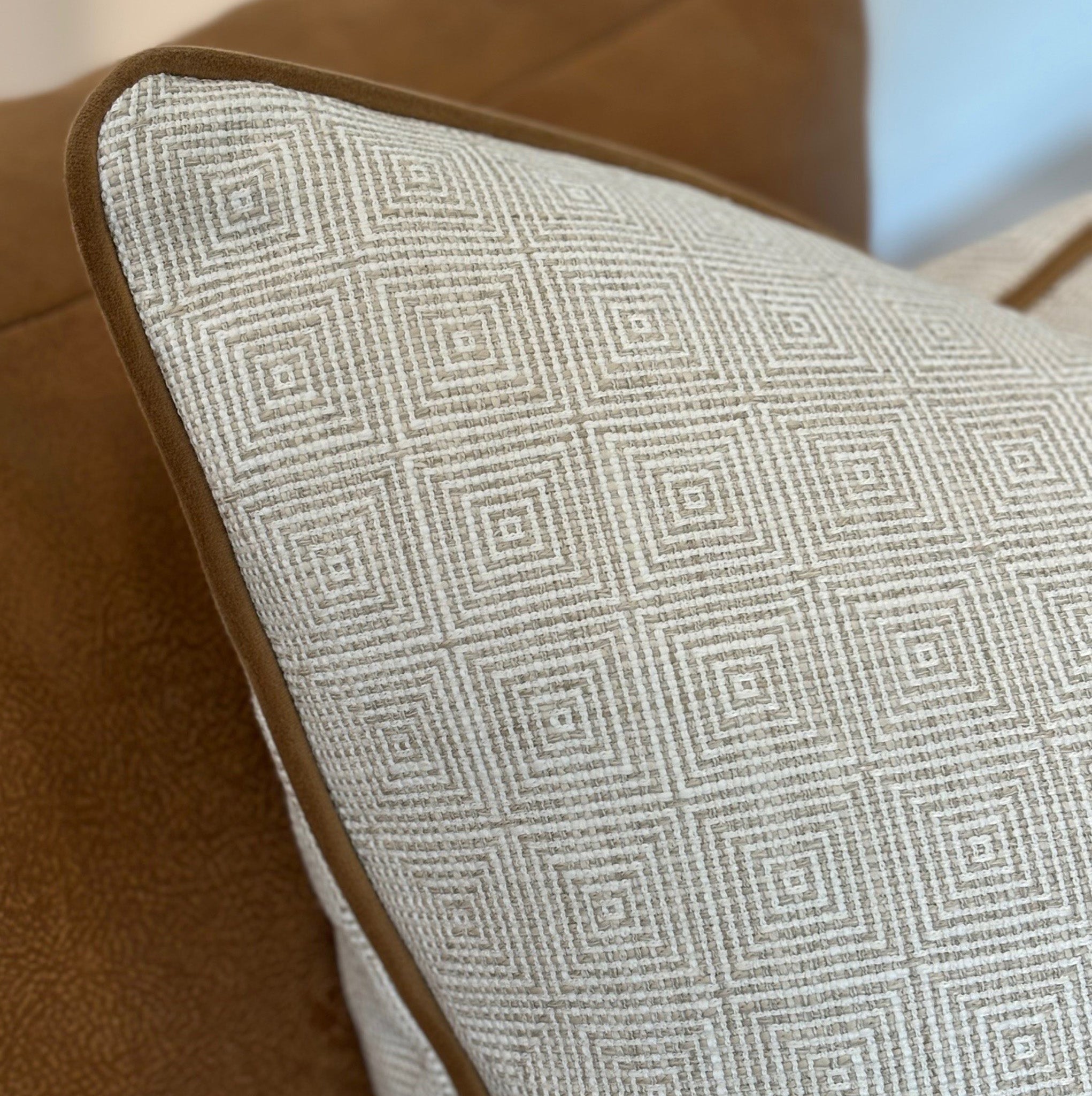 Ecru Geometric Patterned Cushion with Tan Piping